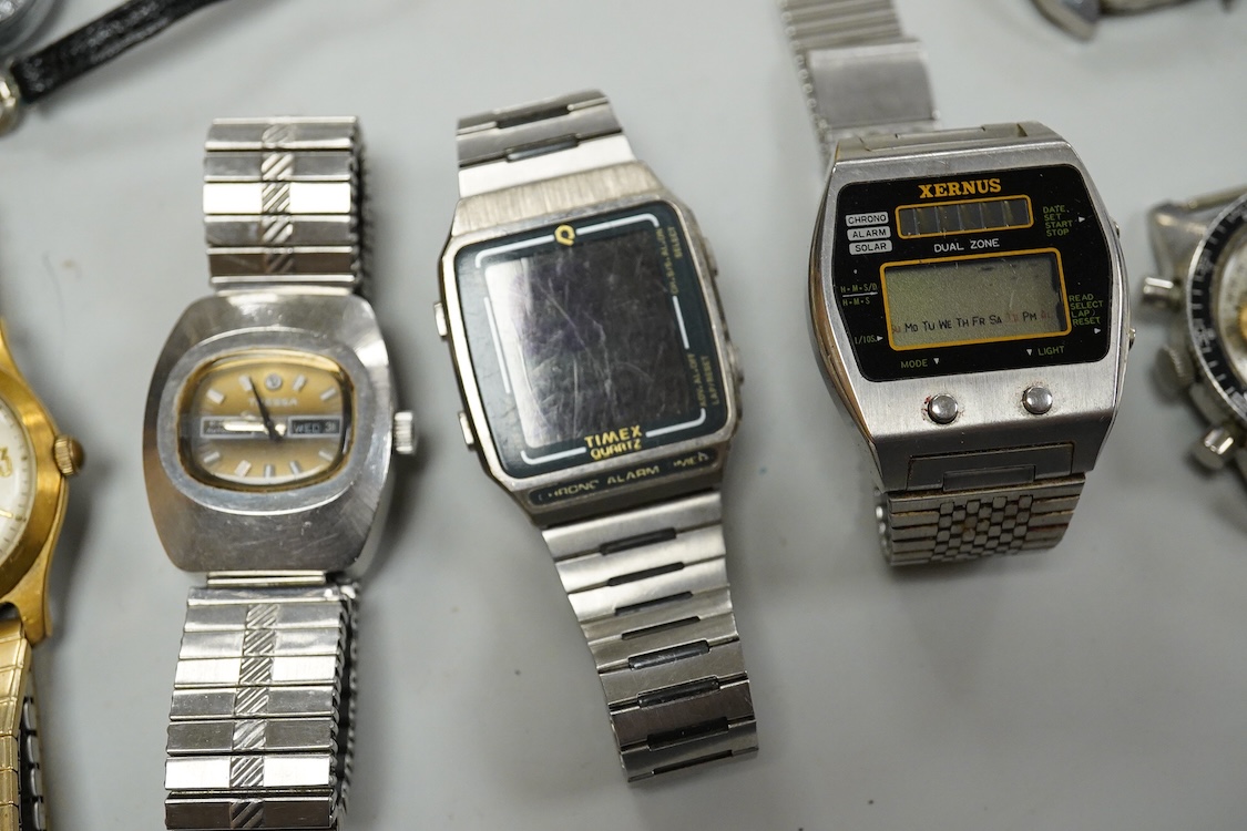 A collection of mostly gentleman’s wristwatches to include a stainless steel Tressa automatic calendar wristwatch, another Tressa wristwatch, Xernus quartz Digital display wristwatch, Timex quartz with digital display et